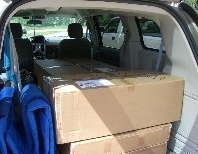 Van loaded with kit headed for Cam's